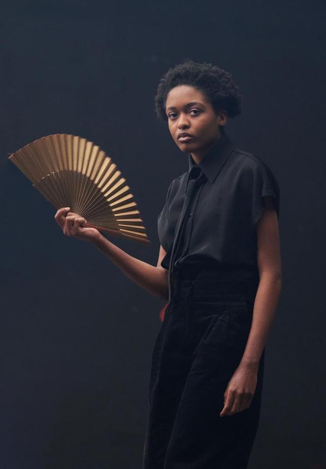 Ella Dacres as Peta in the National Theatre’s “Romeo & Juliet,” directed by Simon Godwin. Cr: Rob Youngson/National Theatre