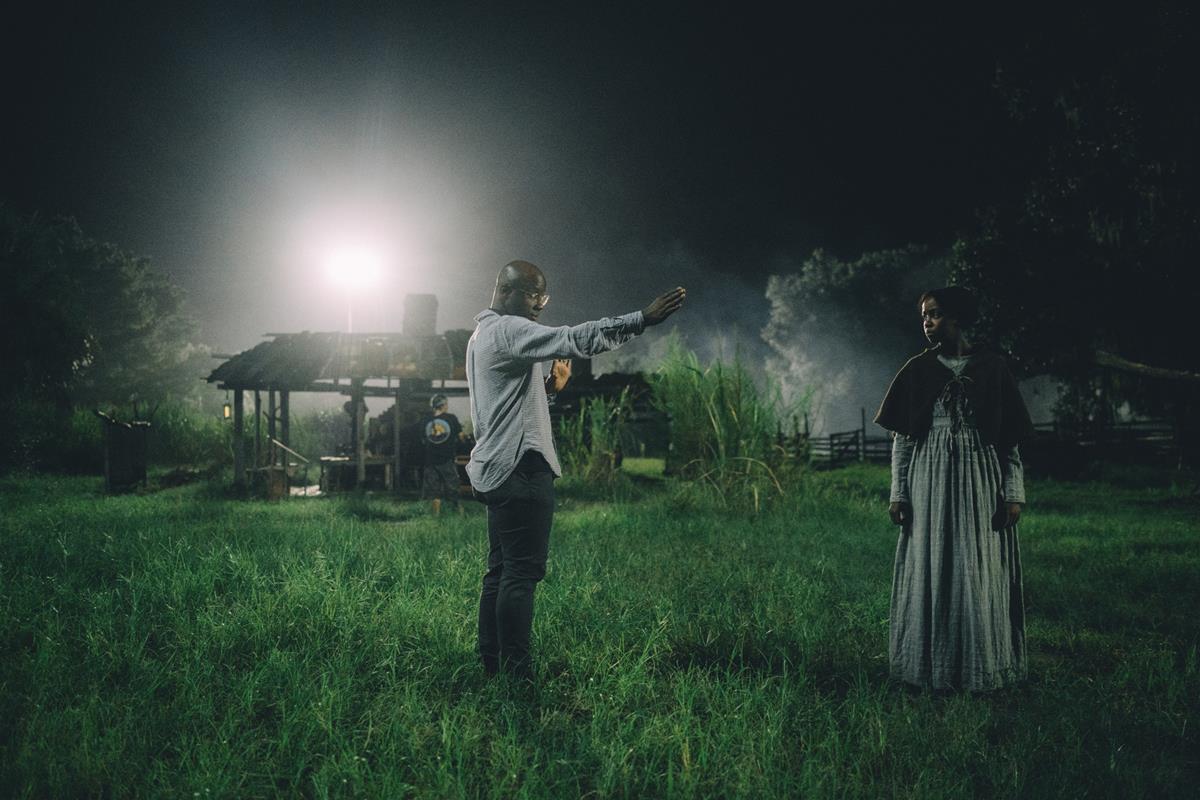 Barry Jenkins and Thuso Mbedu on the set of “The Underground Railroad.” Cr: Atsushi Nishijima/Amazon Studios