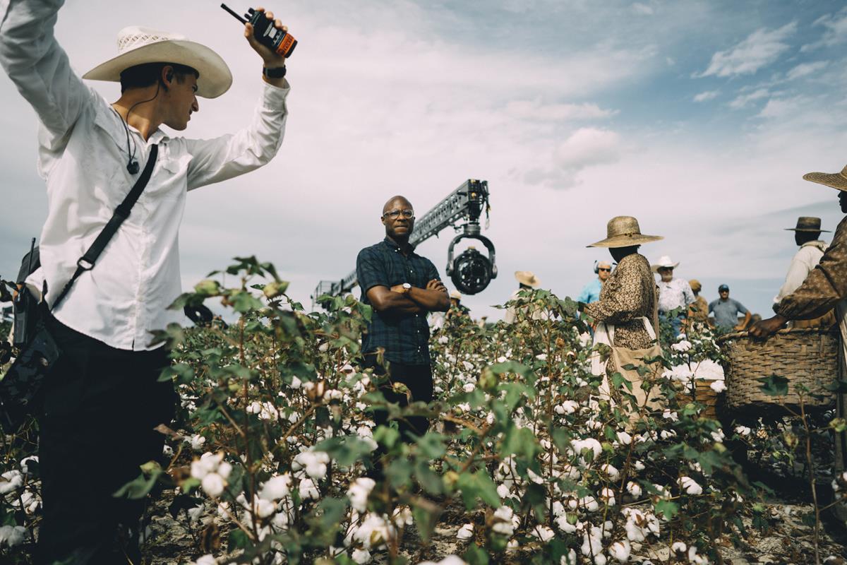Showrunner Barry Jenkins (center) on location while filming “The Underground Railroad.” Cr: Atsushi Nishijima/Amazon Studios