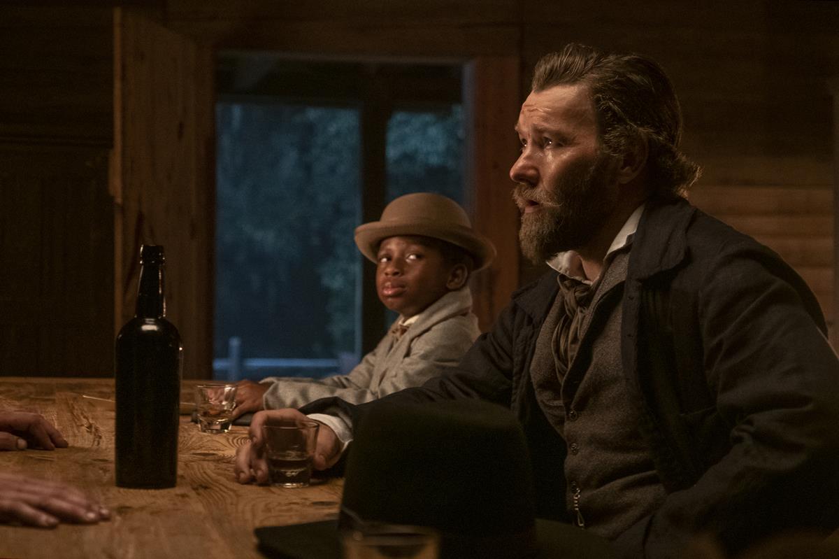 Chase Dillon as Homer and Joel Edgerton as slave catcher Arnold Ridgeway in “The Underground Railroad.” Cr: Kyle Kaplan/Amazon Studios