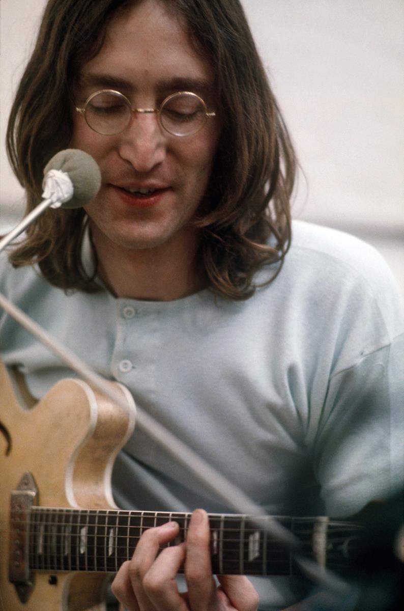 John Lennon during a rehearsal. “The Beatles: Get Back.” Cr: Apple Corps Ltd./Disney