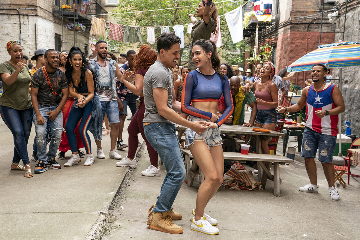 Left to right: Anthony Ramos as Usnavi and Melissa Barrera as Vanessa in Warner Bros. Pictures’ “In the Heights,” a Warner Bros. Pictures release.