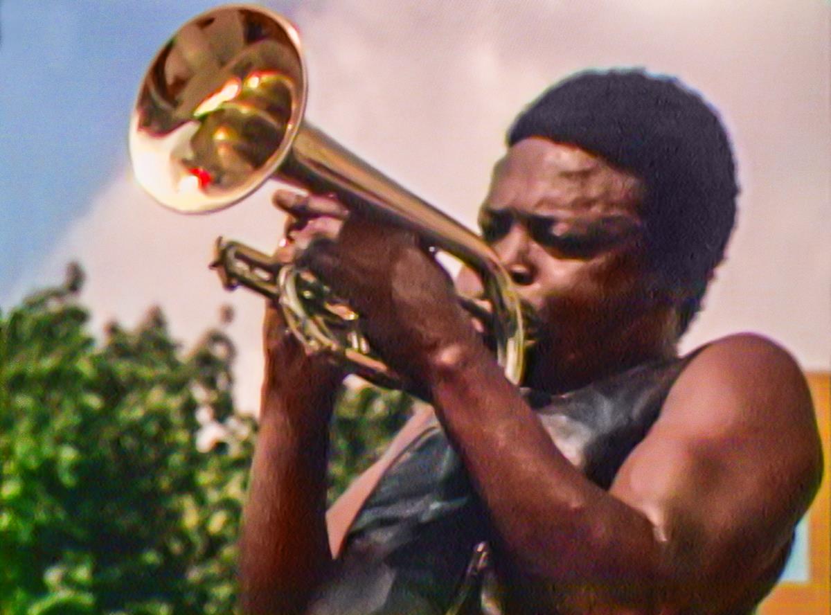 Hugh Masekela performs at the Harlem Cultural Festival in 1969, featured in the documentary “Summer Of Soul (Or, When The Revolution Could Not Be Televised).” Cr: Mass Distraction Media/Searchlight Pictures