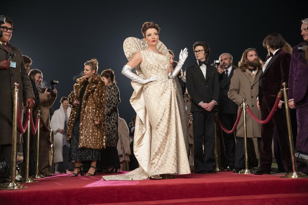 Emma Thompson as the Baroness and Andrew Leung as Jeffrey in Disney’s live-action “Cruella.” Cr: Laurie Sparham/Disney