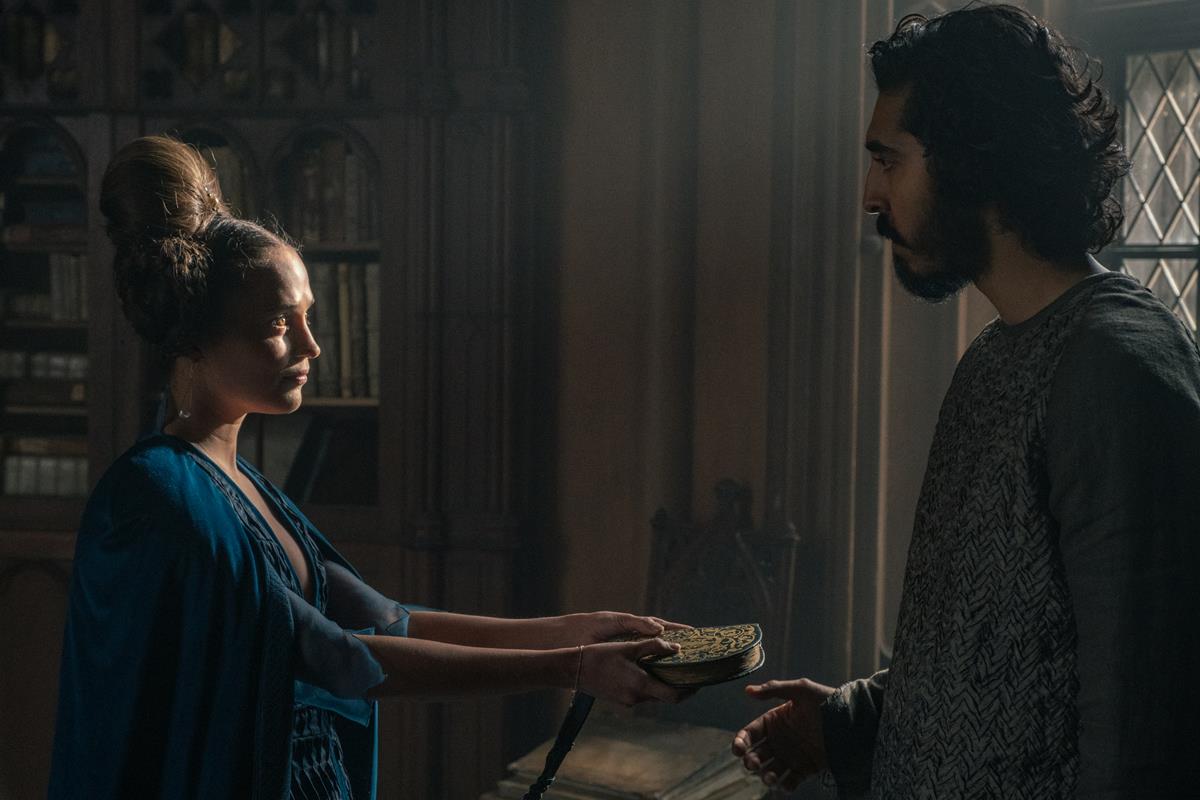 Alicia Vikander and Dev Patel in “The Green Knight.” Cr: Eric Zachanowich/A24