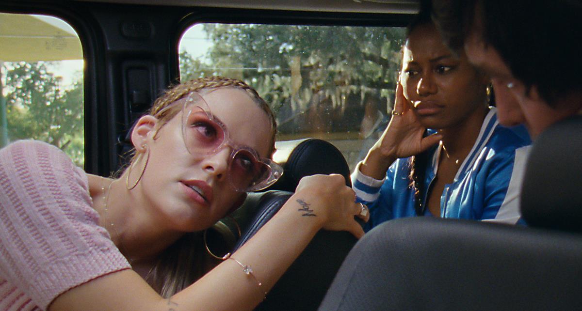 Riley Keough as Stefani and Taylour Paige as Zola in director Janicza Bravo’s “Zola.” Cr: Anna Kooris/A24