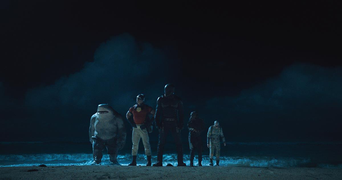 King Shark, John Cena as Peacemaker, Idris Elba as Bloodsport, Daniela Melchior as Ratcatcher 2 and David Dastmalchian as Polka-Dot Man in director James Gunn’s “The Suicide Squad.” Cr: Warner Bros. Pictures/DC Comics