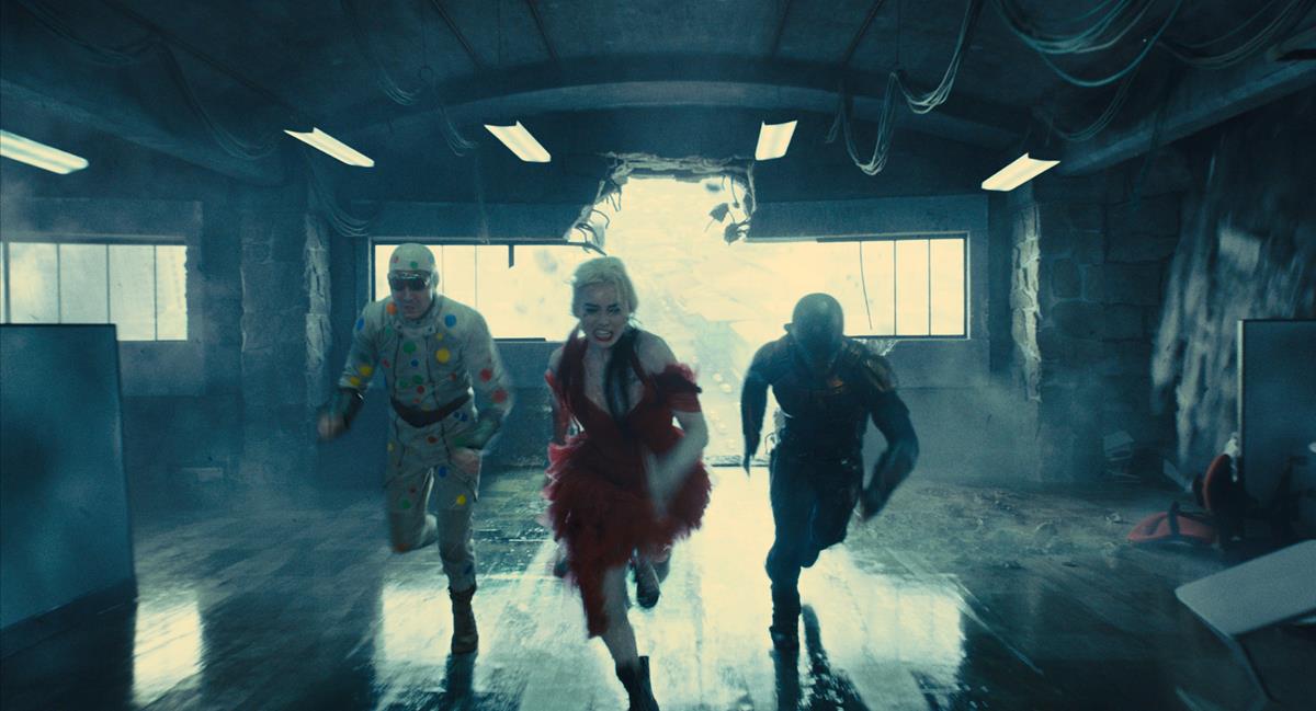 David Dastmalchian as Polka Dot Man, Margot Robbie as Harley Quinn and Idris Elba as Bloodsport in director James Gunn’s “The Suicide Squad.” Cr: Warner Bros. Pictures/DC Comics