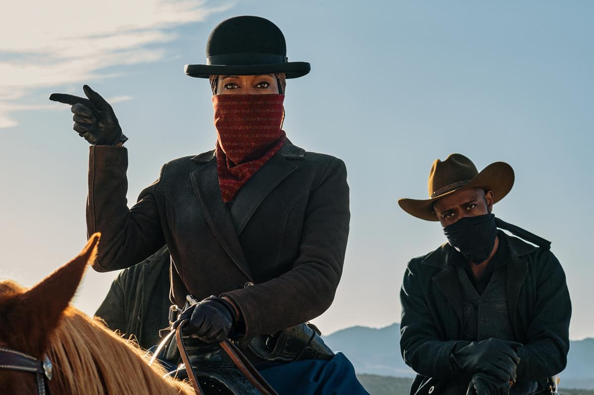 Regina King as Trudy Smith and Lakeith Stanfield as Cherokee Bill in director Jeymes Samuel’s “The Harder They Fall.” Cr: Netflix