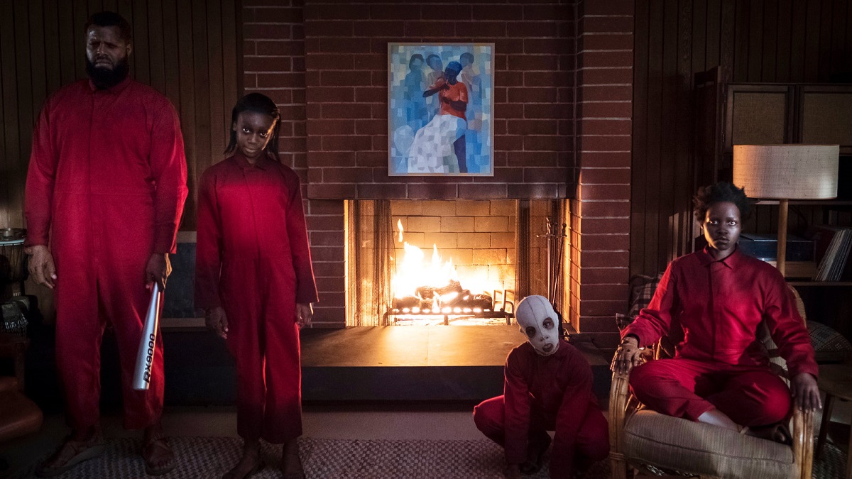 Winston Duke as Gabe Wilson/Abraham, Shahadi Wright Joseph as Sora Wilson/Umbrae, Evan Alex as Jason Wilson/Pluto, and Lupita Nyong’o as Adelaide Wilson/Red in director Jordan Peele’s “Us.” Cr: Universal Pictures