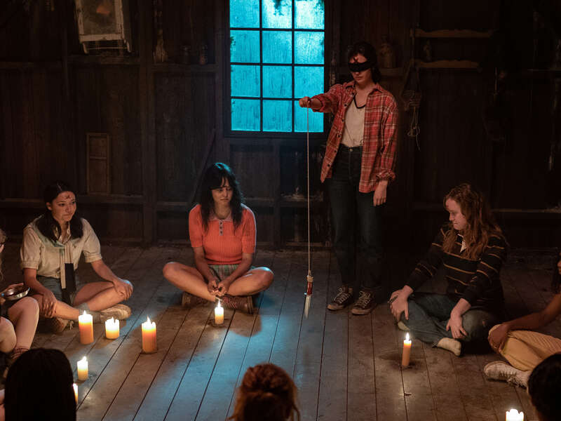 Alexa Barajas as Teen Mari, Courtney Eaton as Teen Lottie, and Liv Hewson as Teen Van in season 1 episode 5 of “Yellowjackets.” Cr: Showtime