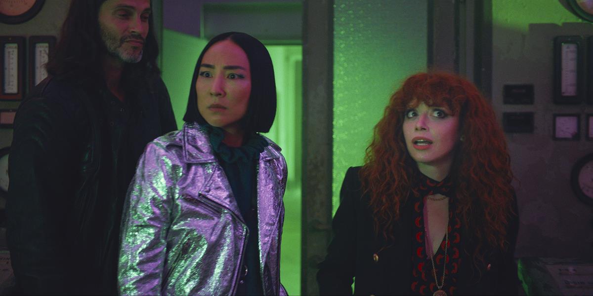 Balázs Czukor as Kristof, Greta Lee as Maxine, and Natasha Lyonne as Nadia Vulvokov in season 2 episode 4 of “Russian Doll.” Cr: Netflix