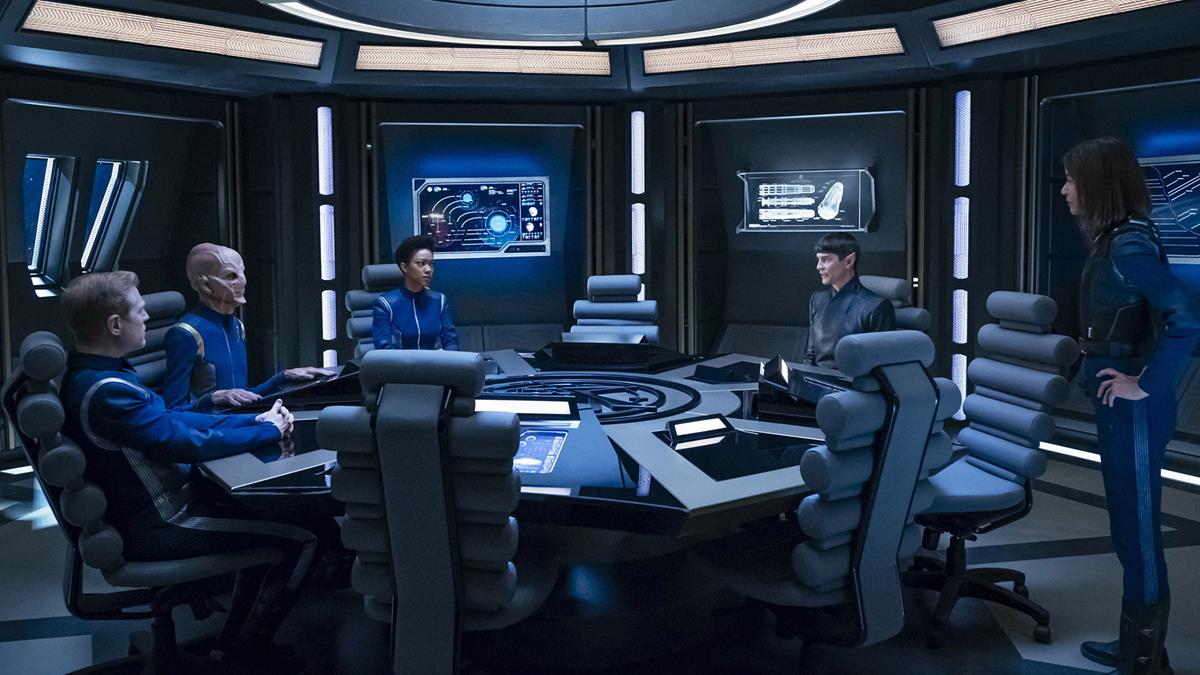 Anthony Rapp as Lieutenant Paul Stamets, Doug Jones as Saru, Sonequa Martin-Green as Michael Burnham, James Frain as Ambassador Sarek, and Jayne Brook as Admiral Cornwell in episode 14 of “Star Trek: Discovery.” Cr: Jan Thijs /Paramount+