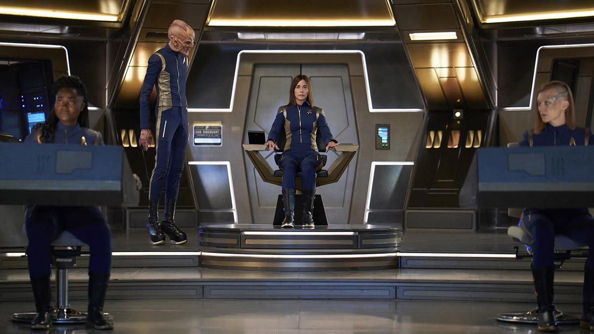 Oyin Oladejo as Lieutenant Junior Grade Joann Owosekun, Doug Jones as Saru, Jayne Brook as Admiral Cornwell, and Emily Coutts as Lieutenant Keyla Detmer in episode 14 of “Star Trek: Discovery.” Cr: Russ Martin/Paramount+