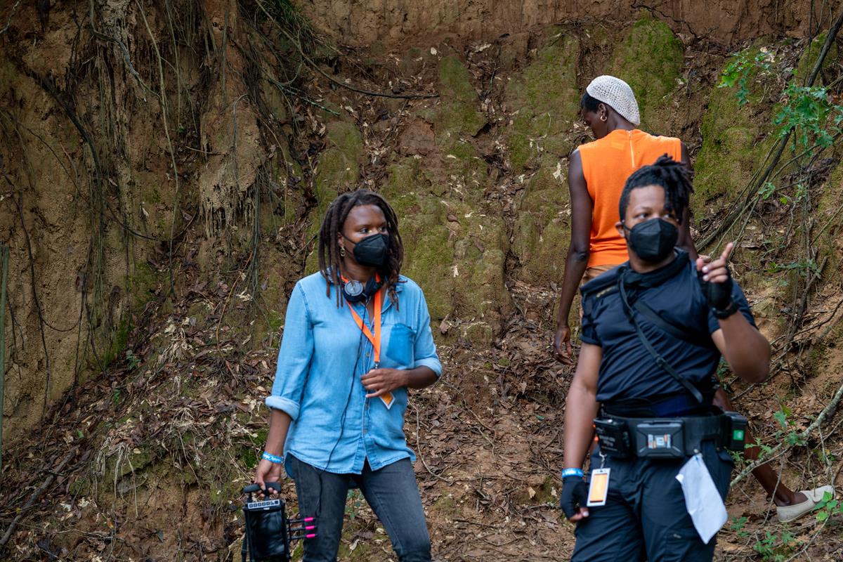 Director Raven Jackson, Sheila Atim and DP Jomo Fray on the set of “All Dirt Roads Taste of Salt.” Cr: Jaclyn Martinez/A24