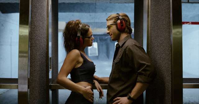 Adria Arjona and Glen Powell in “Hit Man” Cr. Netflix